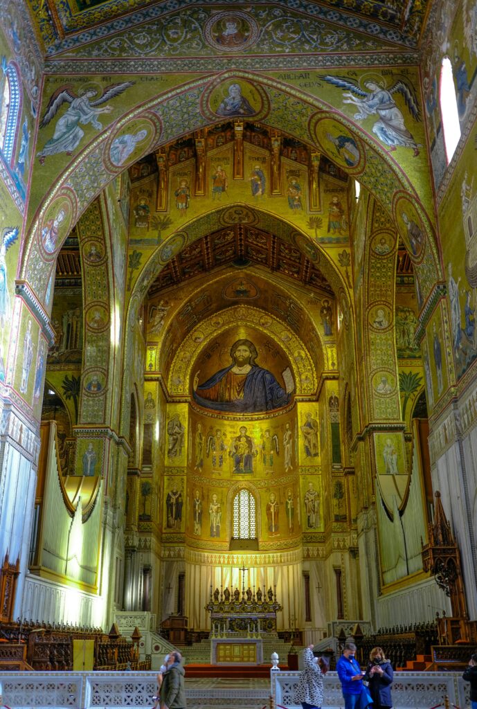 Stunning mosaic-decorated interior of Monreale Cathedral, Sicily, Italy, capturing its grandeur.